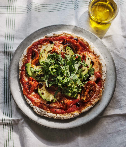 Gluten Free Pizza with Avocado, Semi Dried Tomatoes, Rocket Leaves & Balsamic Glaze