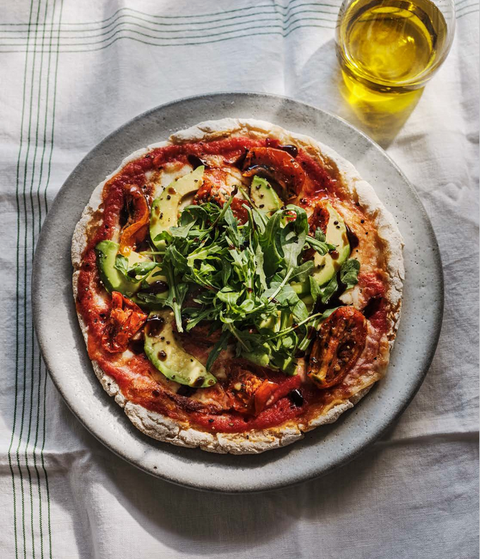 Gluten Free Pizza with Avocado, Semi Dried Tomatoes, Rocket Leaves & B