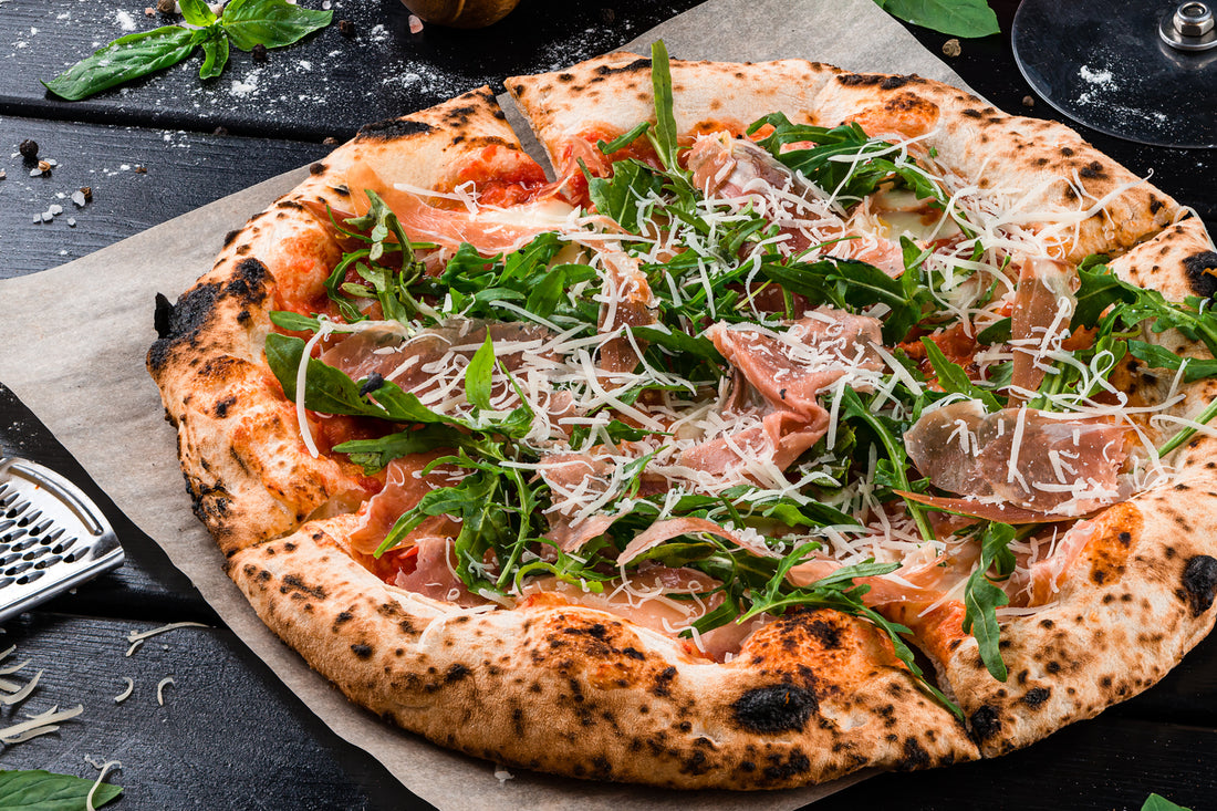 Pizza with Smoked Mozzarella, Parma Ham, Rocket Leaves & Freshly Grated Pecorino Cheese